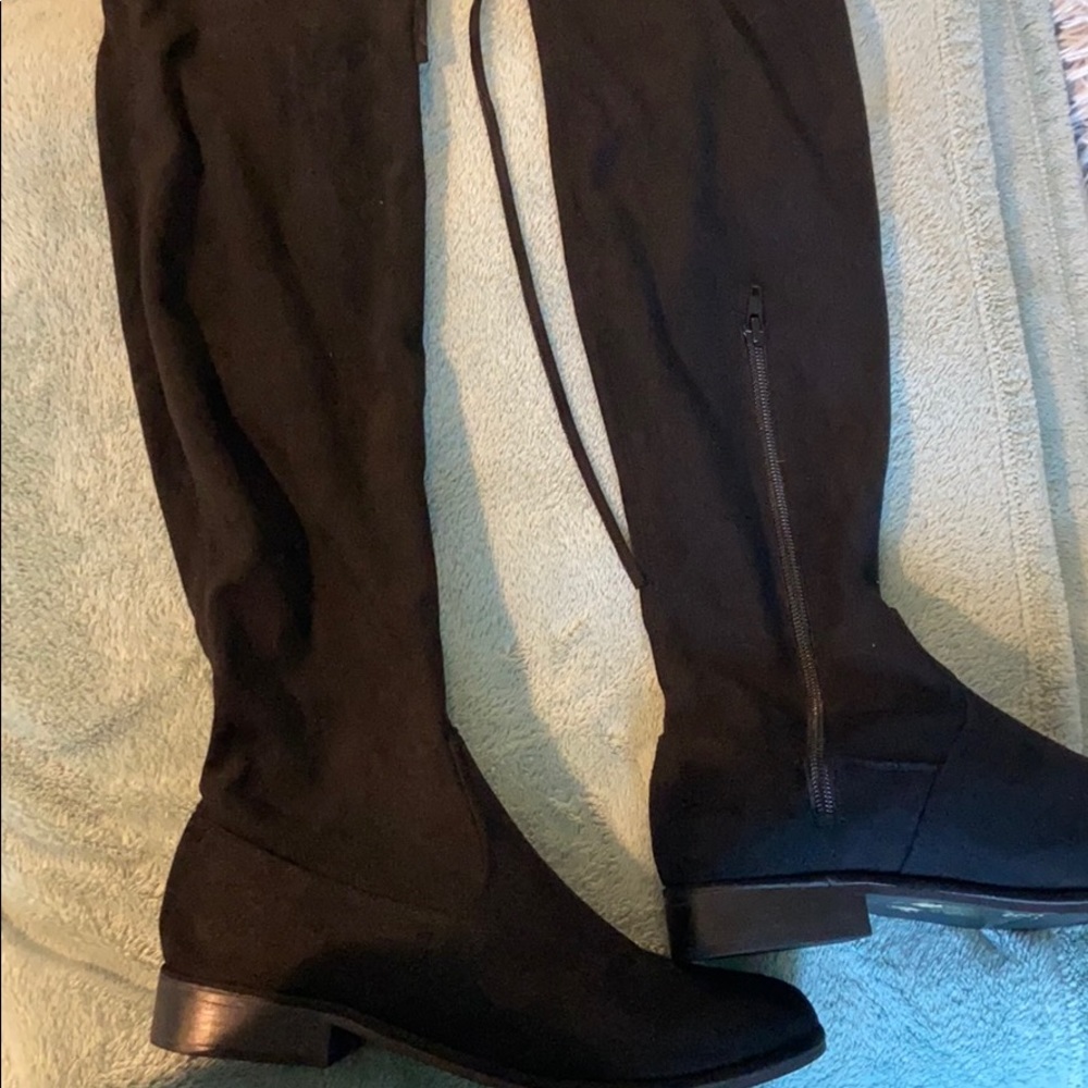 Thigh high boots with ties